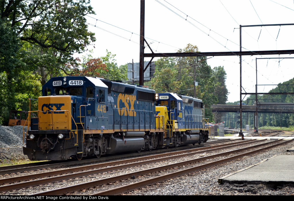 C964-08 backs towards Woodbourne Yard on a restricting signal